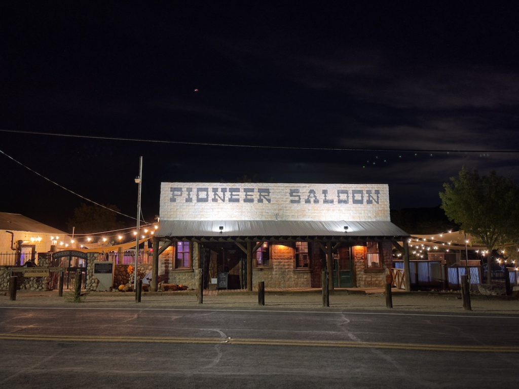 pioneer saloon storefront in goodsprings, nevada at night