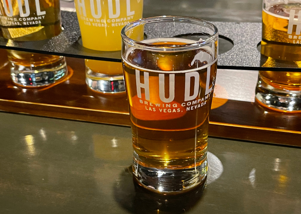 Brews Cruise beer tasting stop at HUDL wait a flight of beer in the photo.