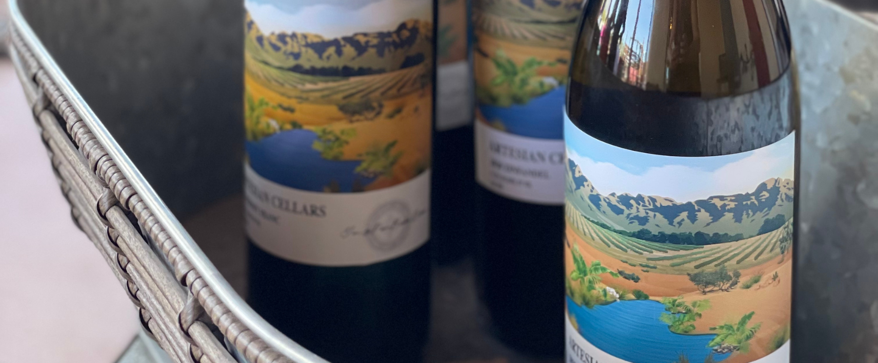 three Artesian Cellars in a tin bucket