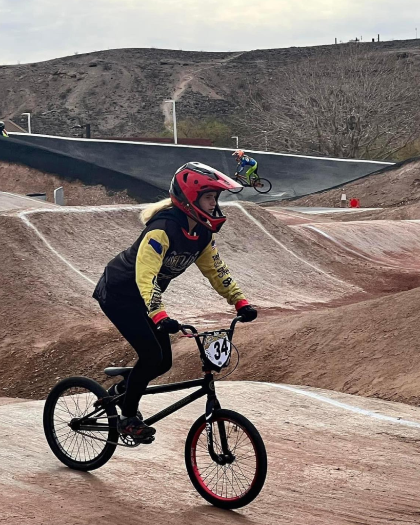 A bike rider cruises the Whitney Mesa BMX dirt track that was named #1 int he country.