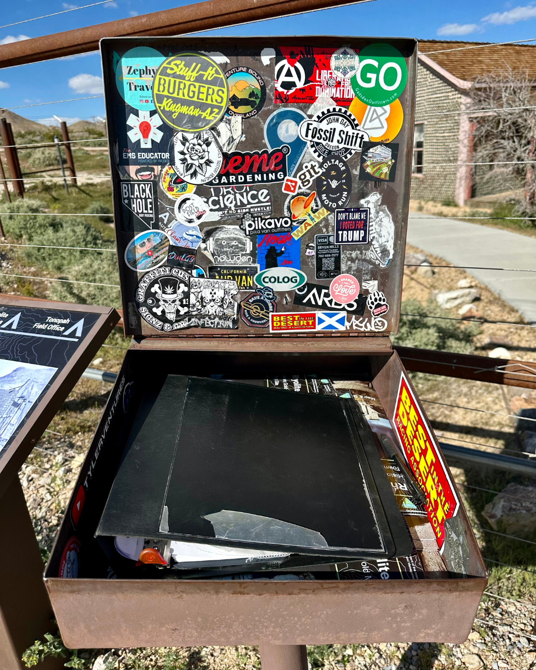 A geocaching box in front of Tom Kelly's Bottle House in Rhyolite Ghost Town outside of Beatty Nevada.