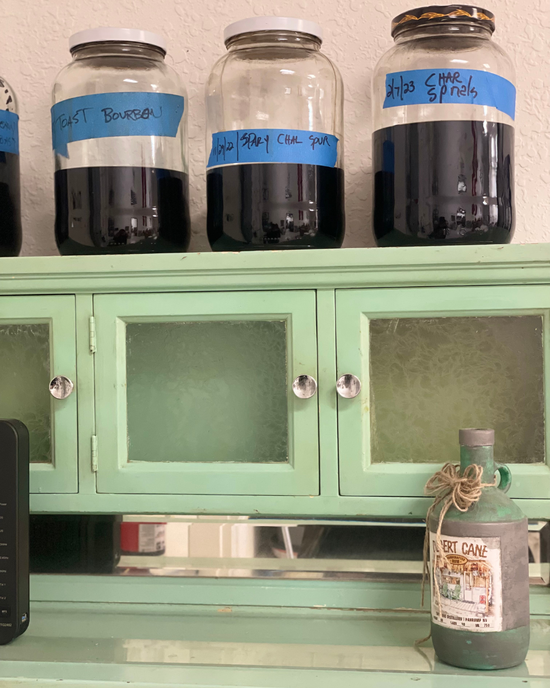 A behind the scenes tour of Desert Cane Distillery in Pahrump shows some jugs of alcohol.