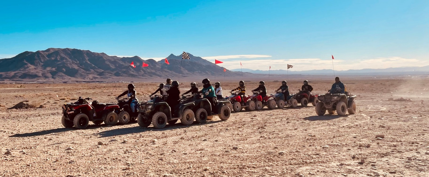 A group of ATV's in the desert with a guided tour by Las Vegas Outdoor Adventures.