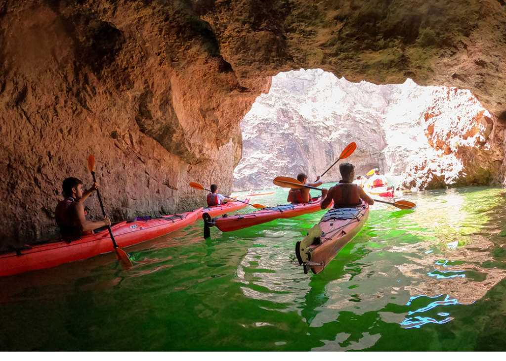 The ultimate Las Vegas kayaking adventure with Evolution Expeditions, the leading outfitter in the Black Canyon. Kayakers in Emerald Cave.