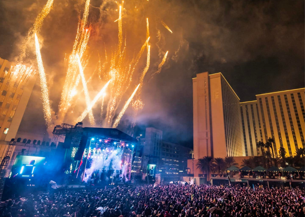 Downtown Las Vegas Events Center concert wit fire works going off.