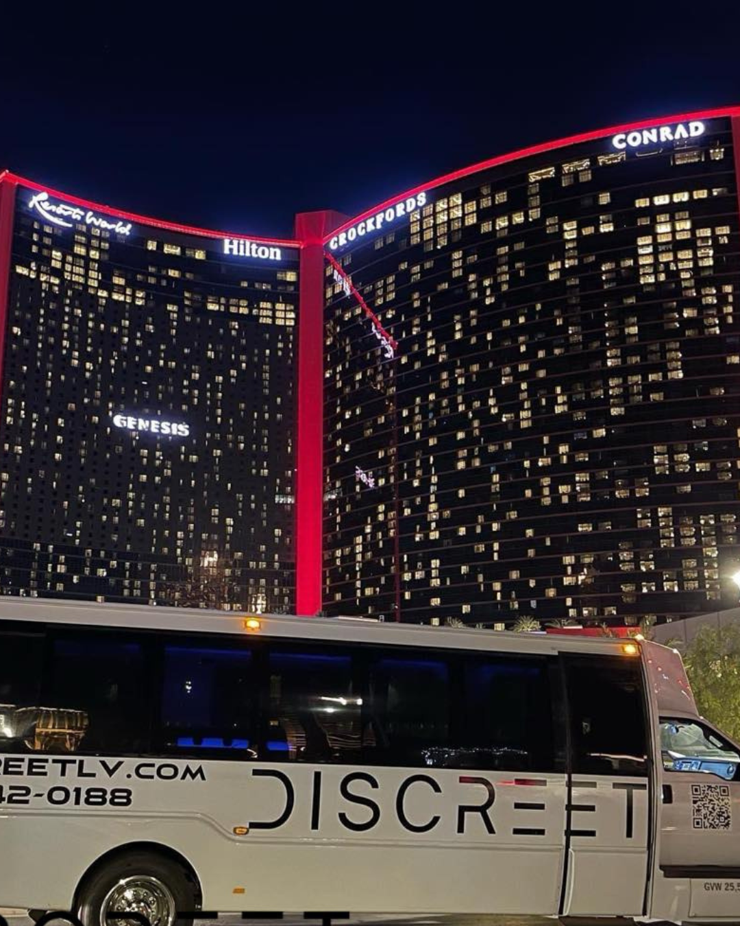 A Discreet Transportation party bus in front of other Resorts World.